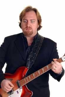Booking agent for Mitch Benn