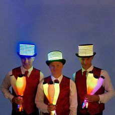 Booking agent for glowing juggling troupe
